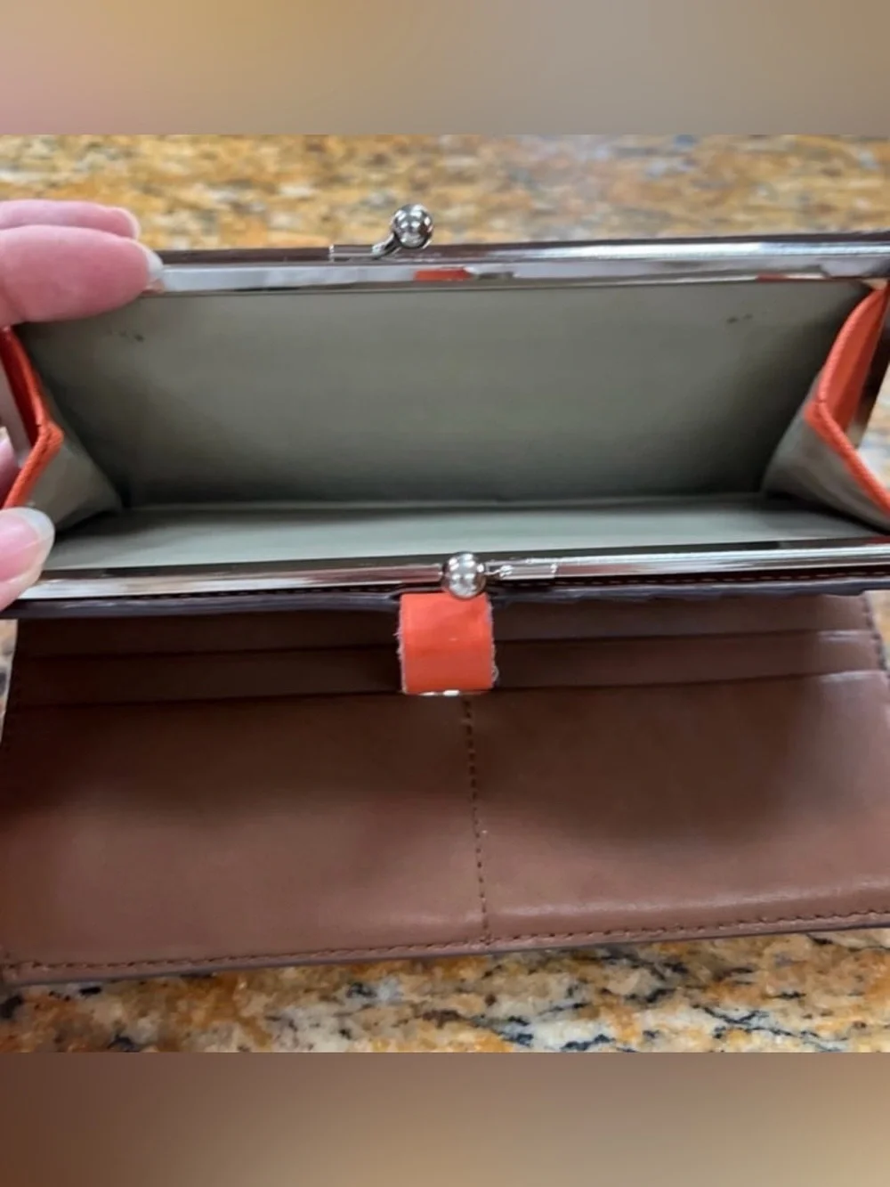 Tumi Orange and brown leather wallet